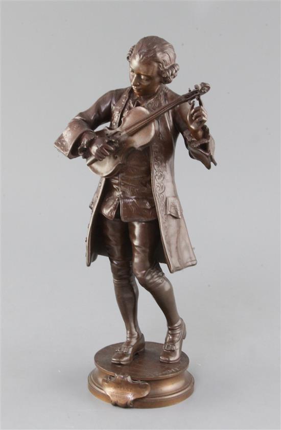 Adrien Etienne Gaudez (1845-1902). A late 19th century patinated bronze study of young Mozart standing tuning his violin, height 13.25i